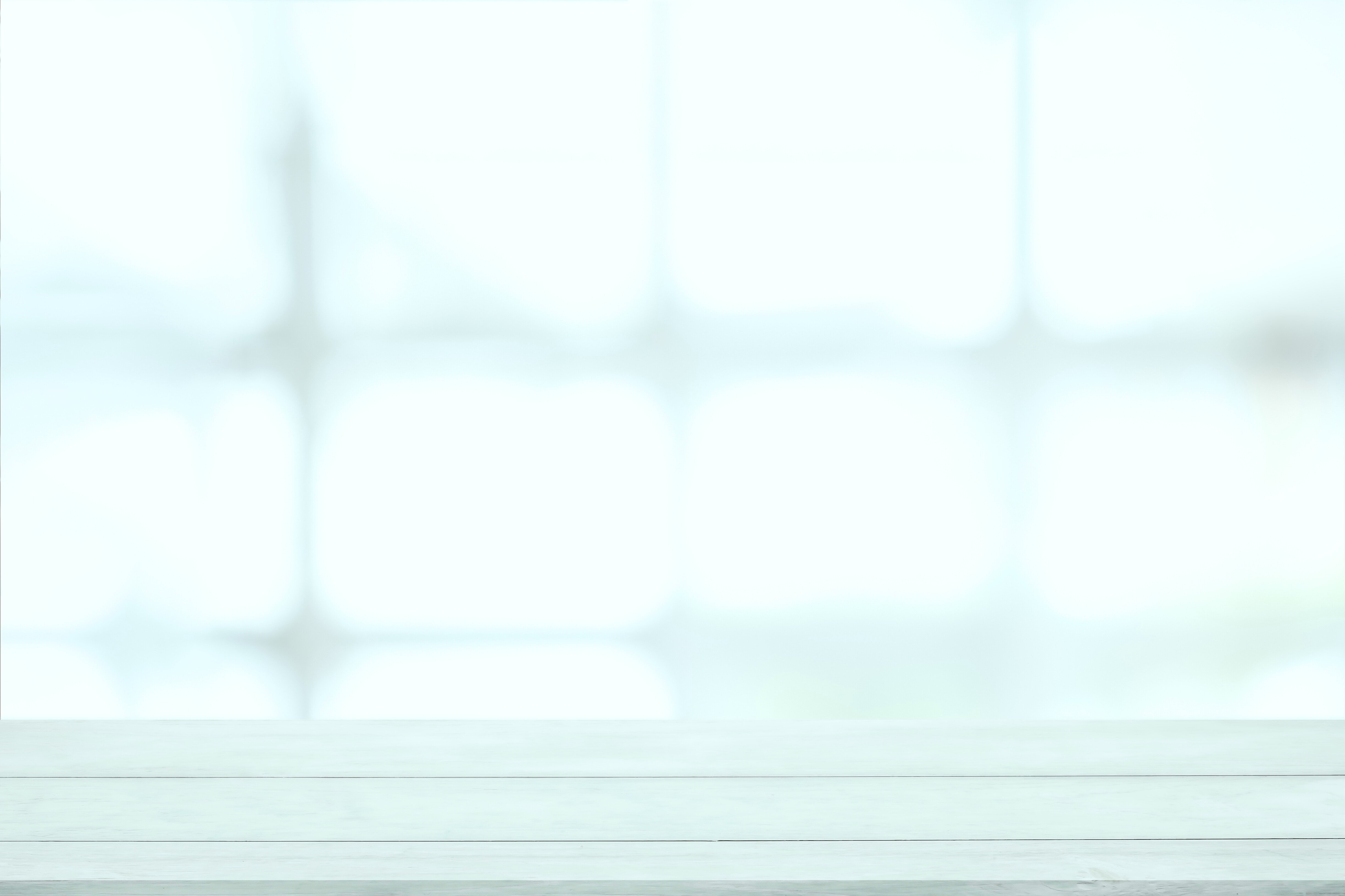 Empty White Wooden Table with Blurred Background